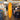 Surf shop interior with orange surfboard, t-shirts, and various merchandise.